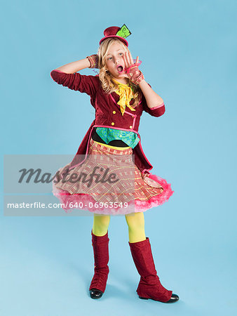 Portrait of girl (10-11) in Mad Hatter costume for Halloween