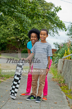 Portrait of mother and son outdoors