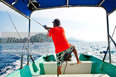 Man fishing on charter boat