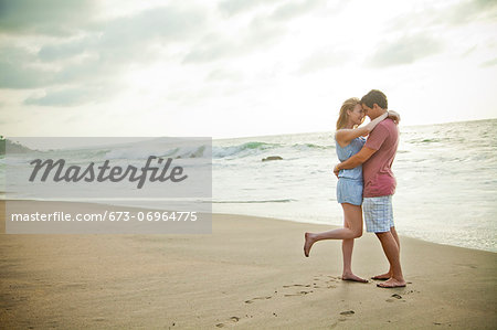 Romantic young couple on beach