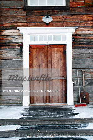 Old wooden house in winter