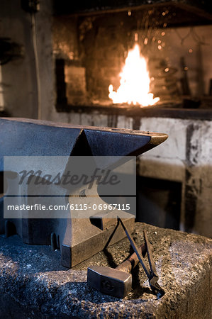 Anvil, tools and a forge in blacksmith shop, Landshut, Bavaria, Germany