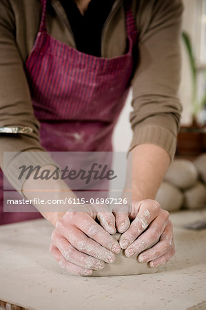 Craftswoman kneading clay, Bavaria, Germany, Europe