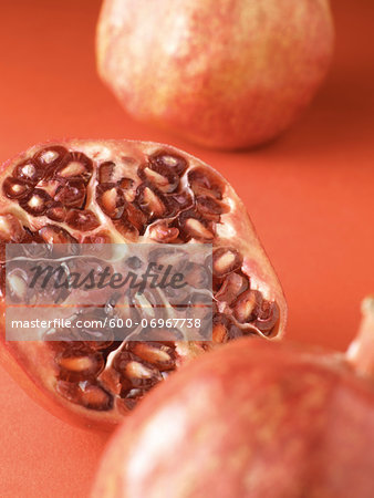 Close-up of Pomegranate Cut in Half, Studio Shot