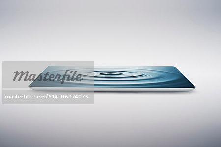 Digital tablet with water ripple on screen Digital tablet with water ripple on screen