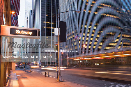 Illuminated subway sign at dusk, New York City, USA