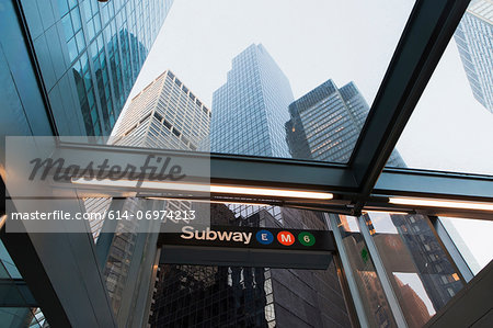 Skyscrapers and subway entrance, New York City, USA