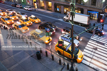 Yellow cabs and cars at pedestrian crossing New York City, USA Yellow cabs and cars at pedestrian crossing New York City, USA
