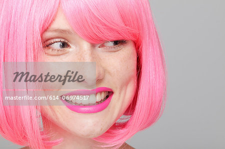 Close up of teenage girl with pink hair