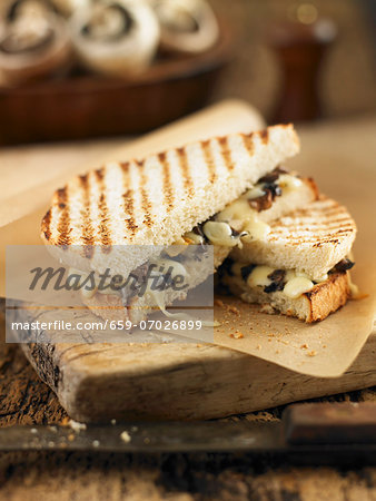 Toasted sandwiches with mushrooms and cheese