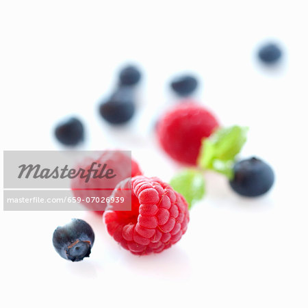 Raspberries and blackberries with no background Raspberries and blackberries with no background