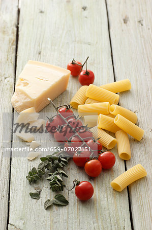 Pasta, tomatoes, oregano and Grana Padano cheese