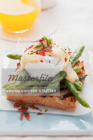 Toast with asparagus and Eggs Benedict
