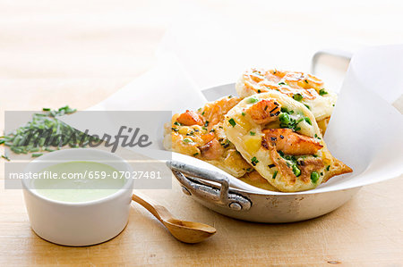 Corn pancakes with salmon and chives