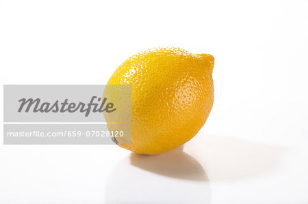 A lemon on a white surface