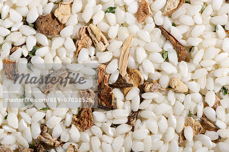 Vialone Nano risotto rice with dried porcini mushrooms, pink peppercorns and parsley Vialone Nano risotto rice with dried porcini mushrooms, pink peppercorns and parsley