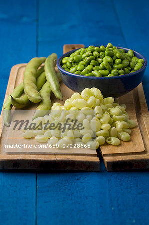 A still life featuring broad beans