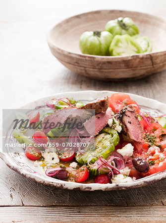 Lamb salad with tomatoes, feta and olives (Greece)