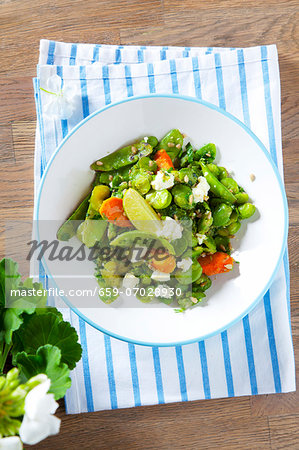 Bean salad with broad beans, peas, carrots, feta and limes Bean salad with broad beans, peas, carrots, feta and limes