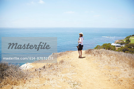 Young woman strolling at coast Palos Verdes, California, USA