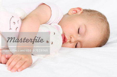 Selective focus on the head of sleeping baby