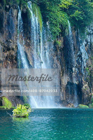 Summer view of large waterfall in Plitvice Lakes National Park (Croatia)