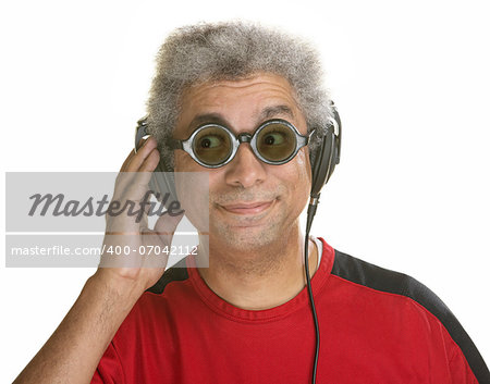 Interested mature male with sunglasses and headphones