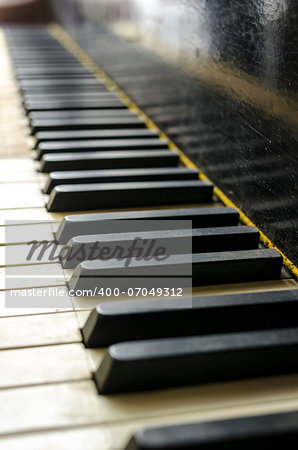 Closeup of vintage piano keys.