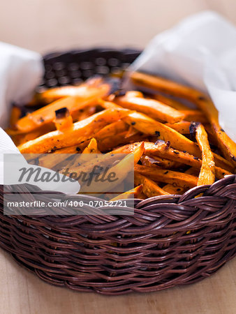 close up of a basket of sweet potato fries