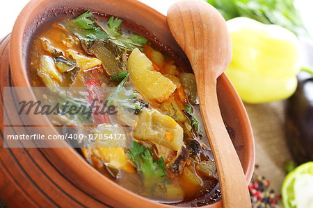 Ragout of vegetables and meat in a clay pot.