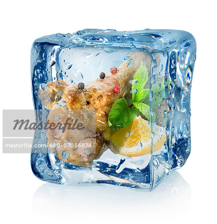 Fried chicken thighs in ice cube isolated on a white background