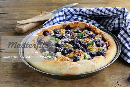 homemade pie  (galette) with grapes and blue cheese