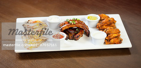 Close up on a platter of finger food for a party served in classy restaurant