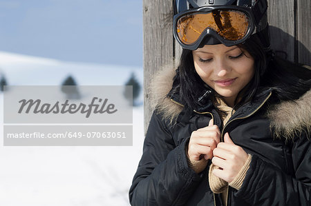 Portrait of young female wearing ski goggles