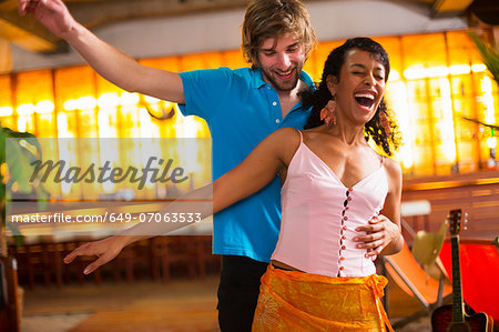 Couple dancing in bar
