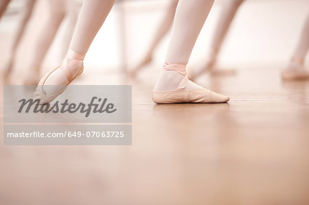 Detail of ballerinas legs in dance class