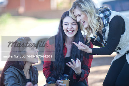 Group of young women fooling about