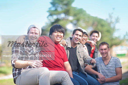 Group of young men fooling about