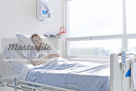 Patient lying in hospital bed Patient lying in hospital bed