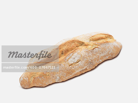 Loaf of bread on white background, studio shot