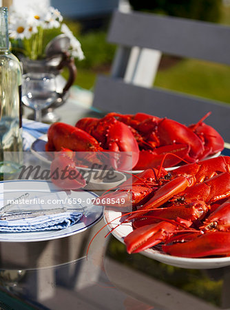 Platters of Fresh Cooked Lobsters on an Outdoor Table