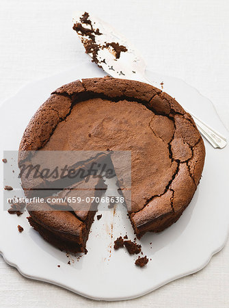 Chocolate cake, partly sliced