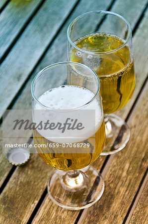 Beer glasses on a wooden table