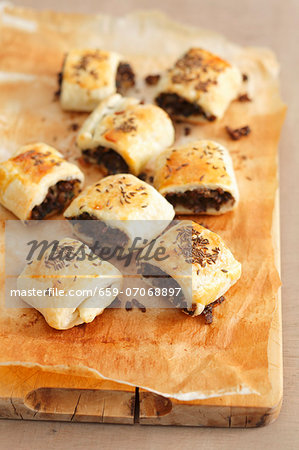 Puff pastry croquets with beef and caraway