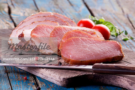 Smoked ham on a wooden board