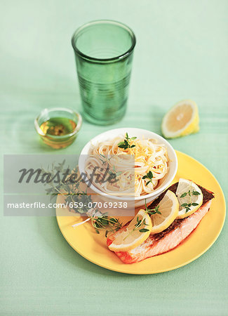 Salmon fillet and noodles with lemon sauce Salmon fillet and noodles with lemon sauce