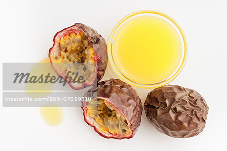 Passion fruit juice and fresh red passion fruit