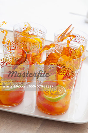 Fruit punch with sticks of caramel