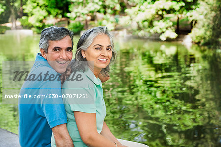 Portrait of a mature couple smiling, Lodi Gardens, New Delhi, India