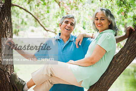 Portrait of a mature couple smiling, Lodi Gardens, New Delhi, India